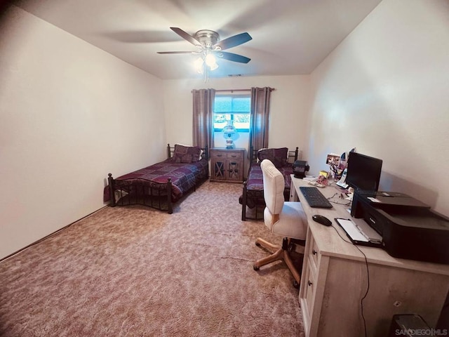 bedroom with ceiling fan and light colored carpet