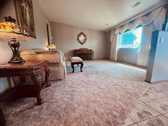 sitting room with carpet floors