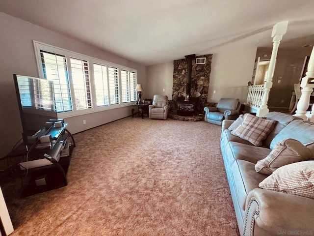 living room featuring carpet flooring and ornate columns