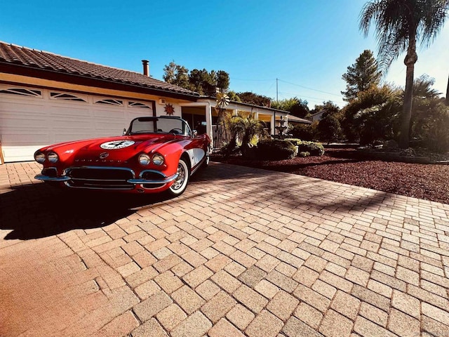 exterior space with a garage