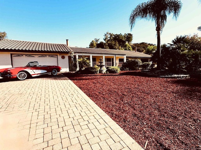 ranch-style home with a garage