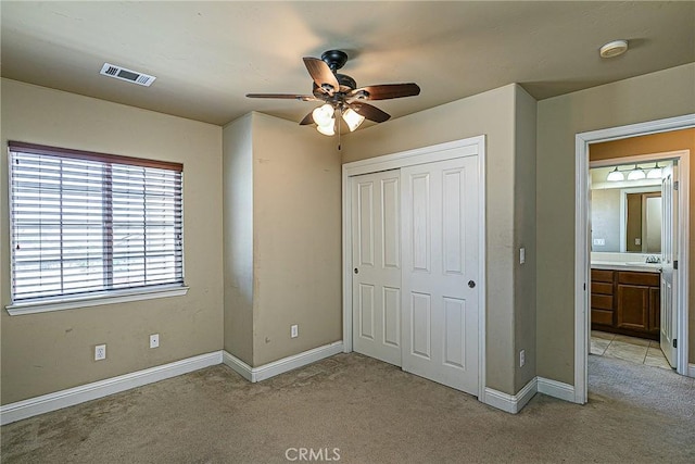 425 Bakeman Ln, Arroyo Grande, CA 93420 - unfurnished bedroom featuring light colored carpet, a closet, and ceiling fan
