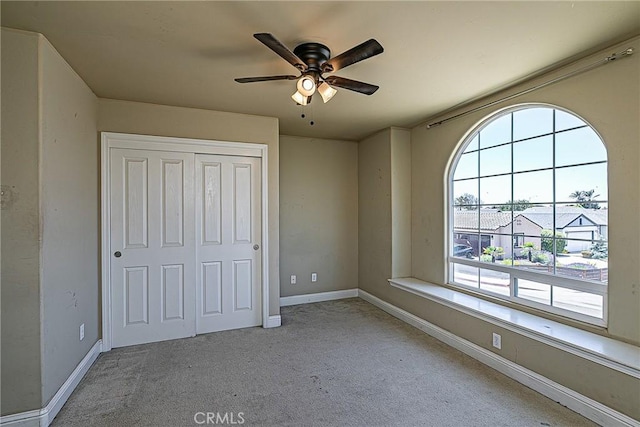 425 Bakeman Ln, Arroyo Grande, CA 93420 - unfurnished bedroom featuring multiple windows, carpet floors, a closet, and ceiling fan