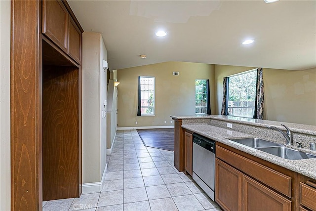 425 Bakeman Ln, Arroyo Grande, CA 93420 - kitchen with stainless steel dishwasher, light tile patterned flooring, vaulted ceiling, recessed lighting, and light stone counters