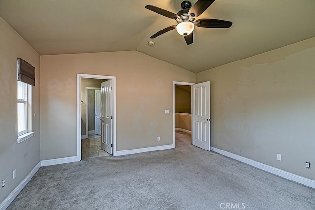 425 Bakeman Ln, Arroyo Grande, CA 93420 - unfurnished bedroom with lofted ceiling, carpet, ensuite bathroom, and a ceiling fan