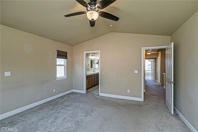 425 Bakeman Ln, Arroyo Grande, CA 93420 - unfurnished bedroom with light carpet, vaulted ceiling, ensuite bath, and ceiling fan