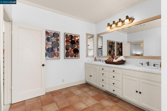 bathroom featuring vanity and ornamental molding