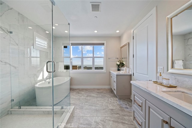 bathroom with vanity and plus walk in shower