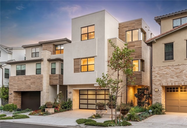 view of front of home with a garage