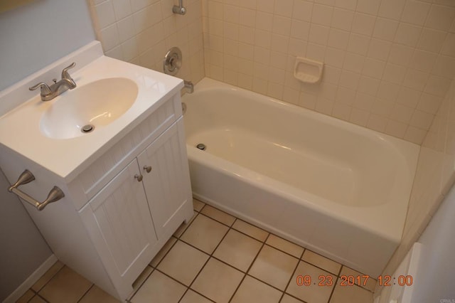 bathroom featuring vanity, shower / tub combination, and tile patterned floors