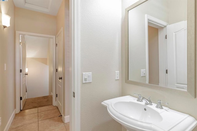 bathroom featuring sink and tile patterned floors