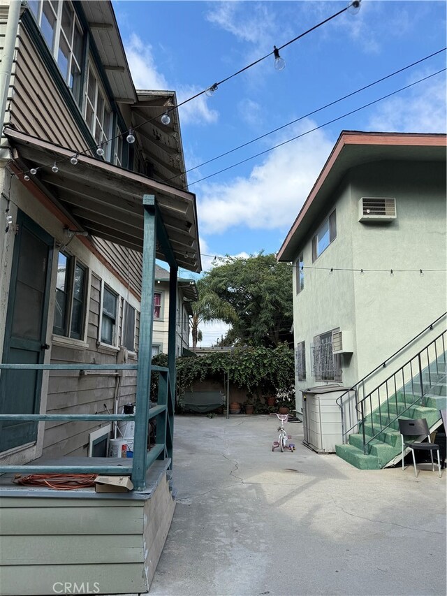 view of property exterior featuring a patio area