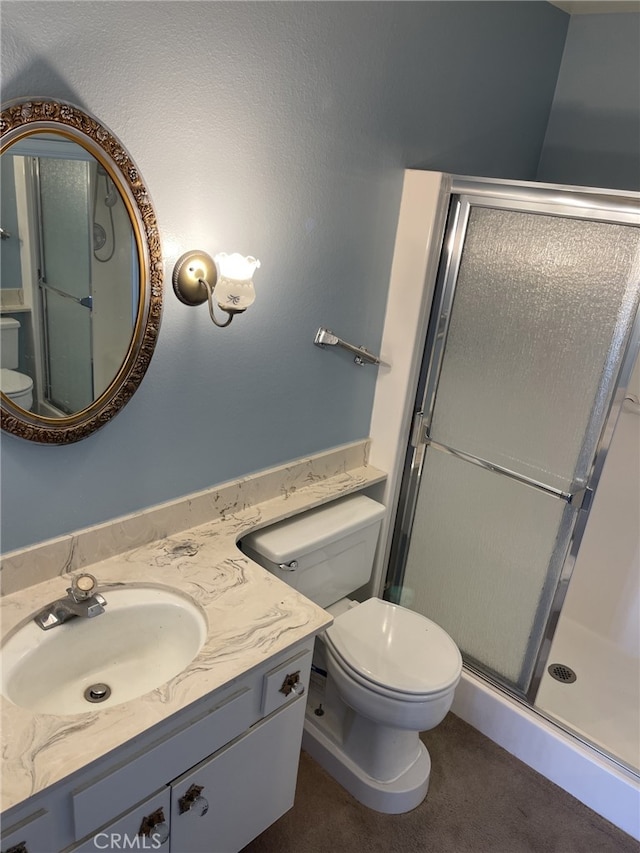 37800 Rudall Ave, Palmdale, CA 93550 - bathroom featuring toilet, a stall shower, and vanity