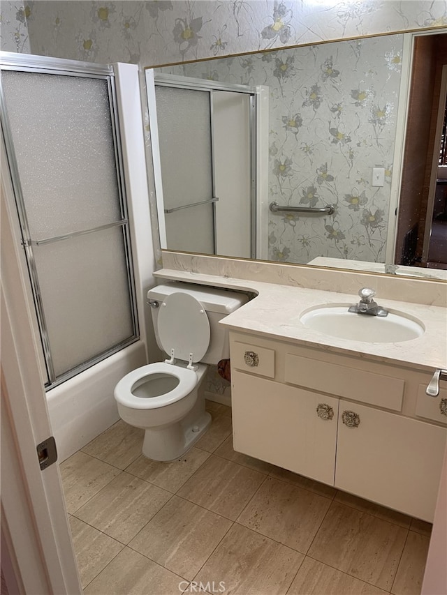 37800 Rudall Ave, Palmdale, CA 93550 - full bathroom featuring wallpapered walls, vanity, tile patterned flooring, enclosed tub / shower combo, and toilet