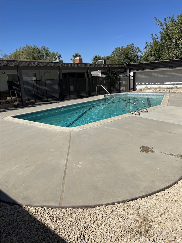 37800 Rudall Ave, Palmdale, CA 93550 - community pool featuring a patio and fence