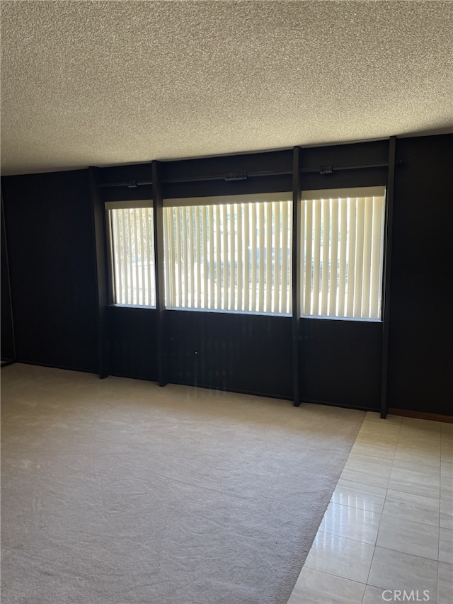 37800 Rudall Ave, Palmdale, CA 93550 - unfurnished room with a textured ceiling and carpet