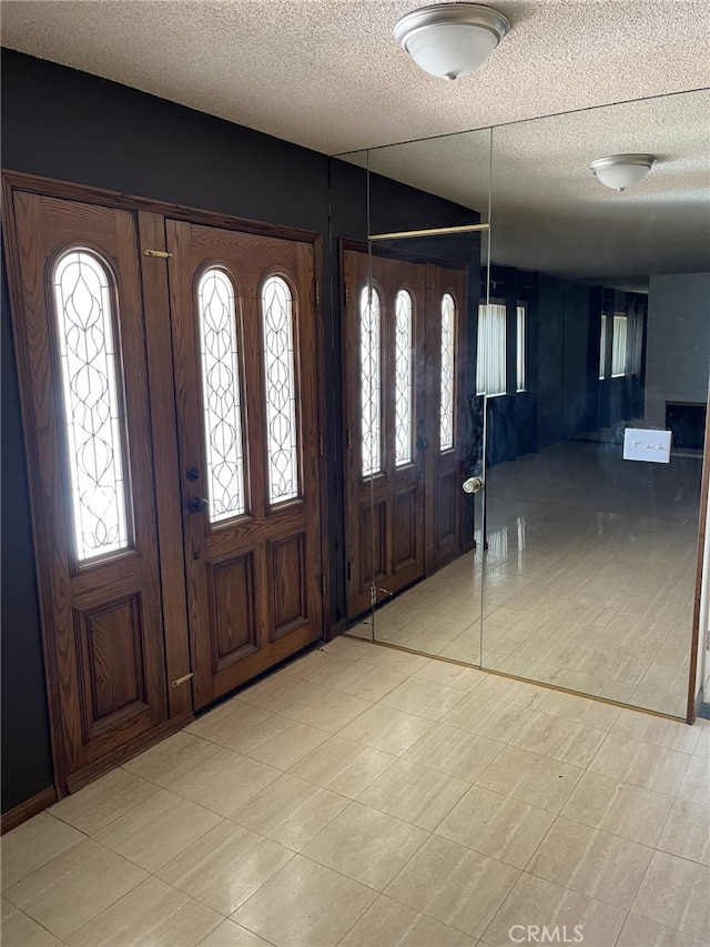 37800 Rudall Ave, Palmdale, CA 93550 - foyer entrance featuring a textured ceiling