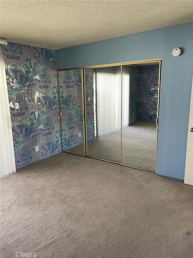 37800 Rudall Ave, Palmdale, CA 93550 - unfurnished bedroom featuring carpet floors and a textured ceiling