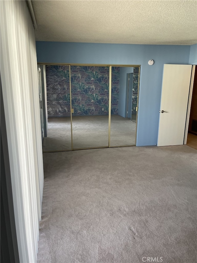 37800 Rudall Ave, Palmdale, CA 93550 - unfurnished bedroom with carpet floors and a textured ceiling