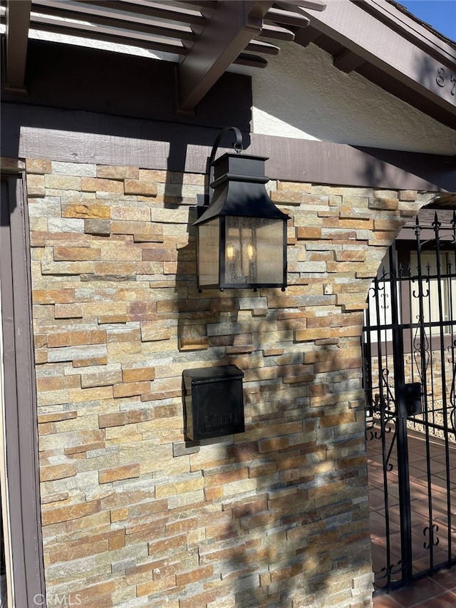 37800 Rudall Ave, Palmdale, CA 93550 - exterior view of a gate and brick siding
