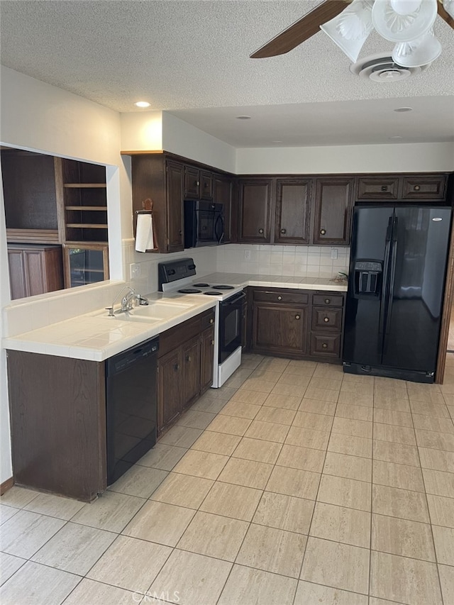 37800 Rudall Ave, Palmdale, CA 93550 - kitchen with black appliances, a textured ceiling, dark brown cabinets, decorative backsplash, and ceiling fan