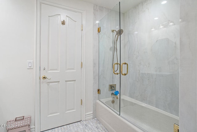 bathroom featuring enclosed tub / shower combo and tile patterned floors