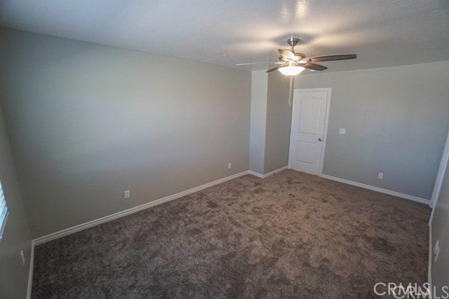 unfurnished room featuring carpet flooring and ceiling fan