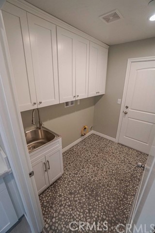 laundry area featuring sink