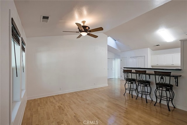 14331 Troy Way, Magalia, CA 95954 - additional living space featuring vaulted ceiling, ceiling fan, light wood finished floors, and visible vents