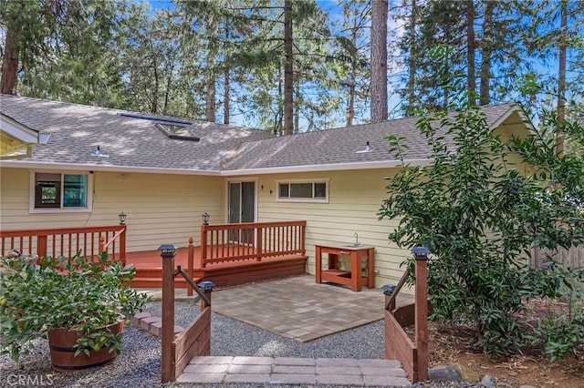 14331 Troy Way, Magalia, CA 95954 - rear view of house with roof with shingles, a deck, and a patio
