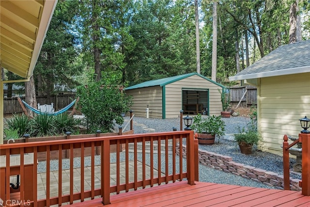 14331 Troy Way, Magalia, CA 95954 - wooden deck featuring an outbuilding, fence, and a storage unit
