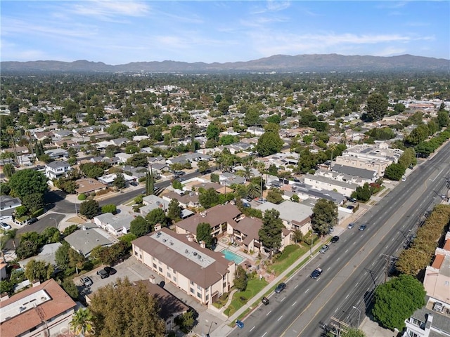 drone / aerial view with a residential view and a mountain view