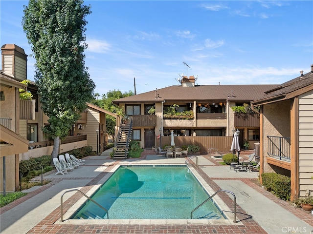 view of pool featuring a patio area