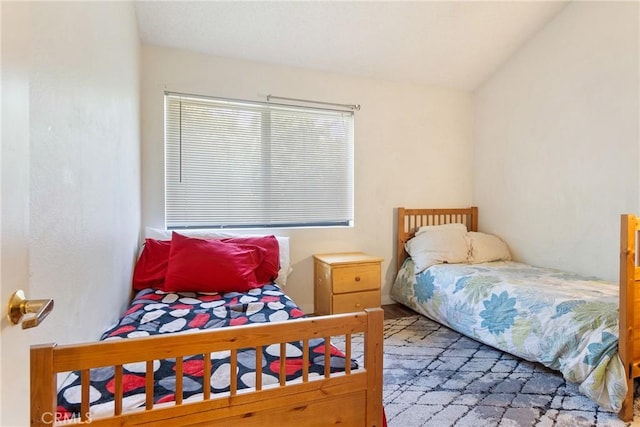 bedroom with vaulted ceiling