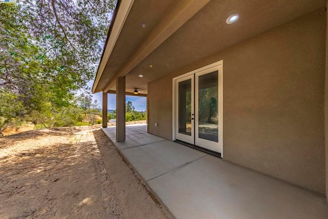 view of patio featuring ceiling fan