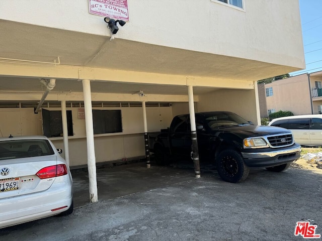 view of car parking with a carport