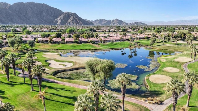 view of property's community with a water and mountain view