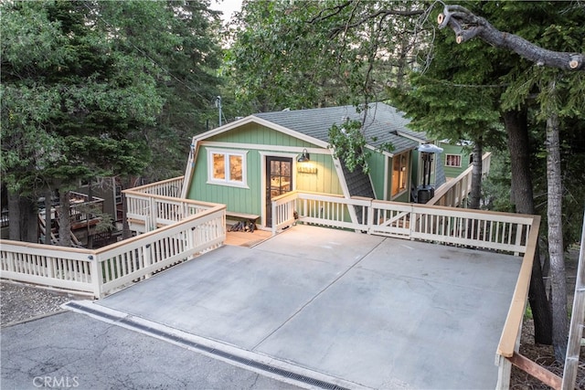 view of front of home with a wooden deck