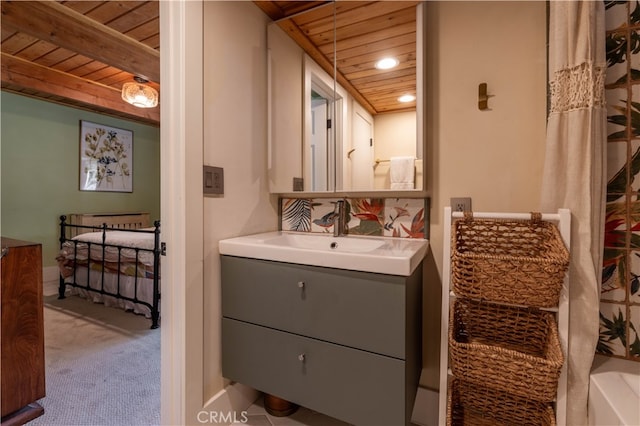 bathroom featuring vanity and wooden ceiling