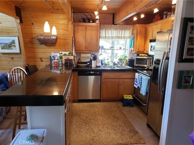 kitchen featuring dishwasher, beamed ceiling, black range with electric cooktop, sink, and light tile patterned floors