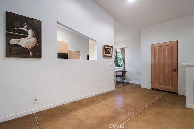 corridor with concrete flooring