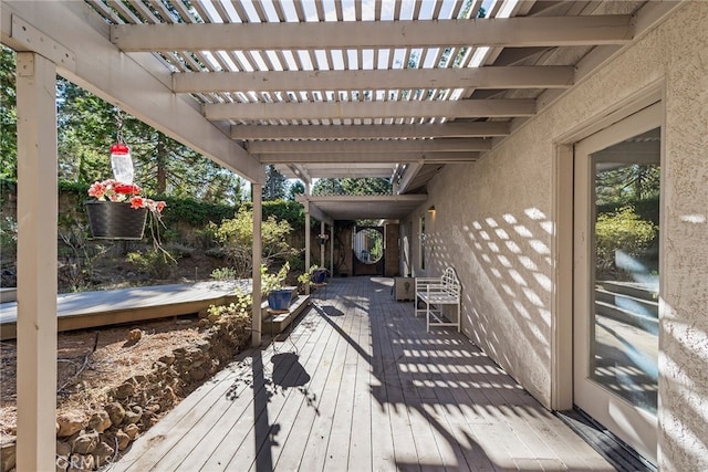 wooden terrace featuring a pergola