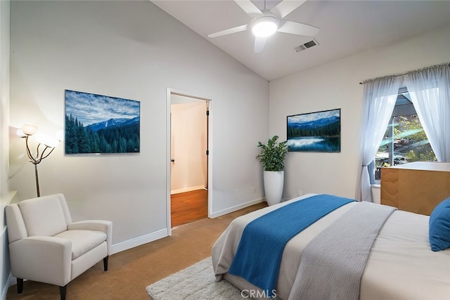 carpeted bedroom featuring ceiling fan and lofted ceiling