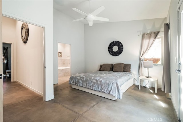 bedroom featuring concrete flooring, connected bathroom, and ceiling fan