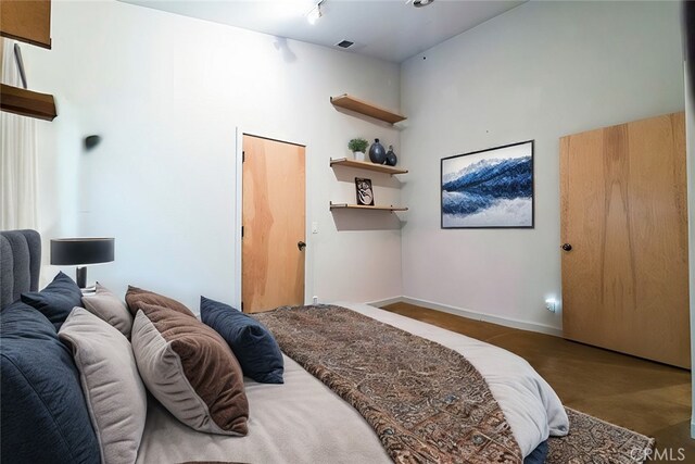 bedroom with a high ceiling