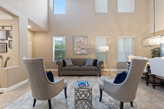 tiled living room featuring a high ceiling