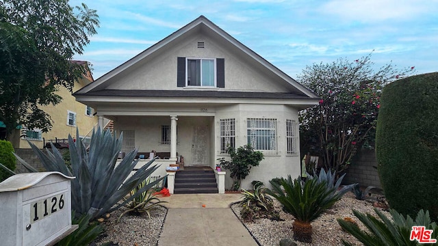 view of front of house featuring covered porch