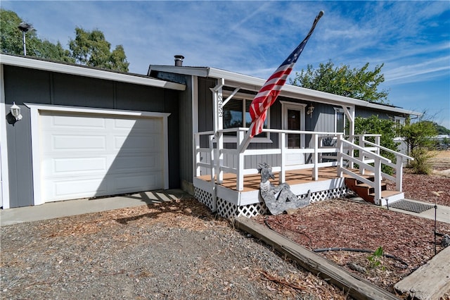 single story home featuring a garage