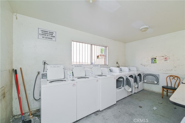 laundry room with washer and clothes dryer