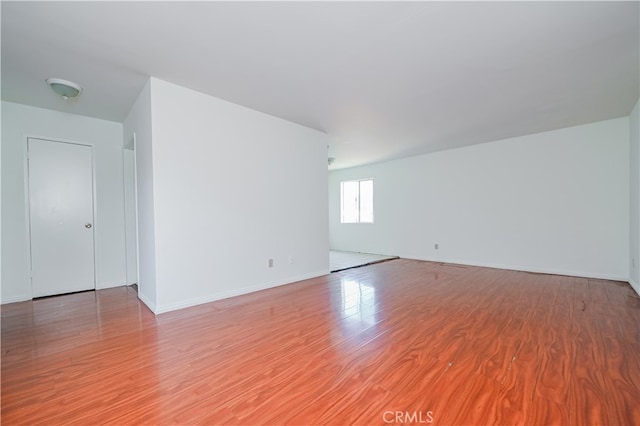 unfurnished room featuring light wood-type flooring